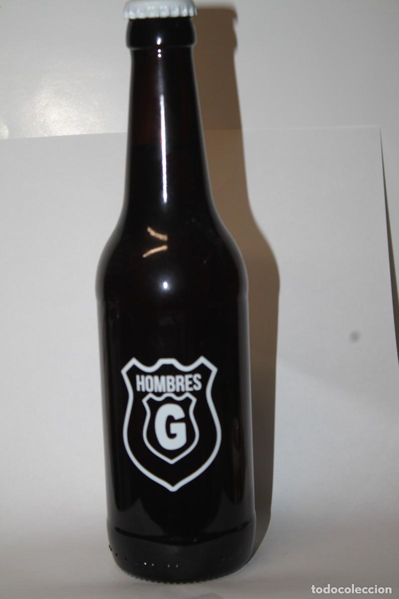 Coleccionismo de cervezas: BOTELLA CERVEZA ARTESANAL HOMBRES G 33 CL. LLENA