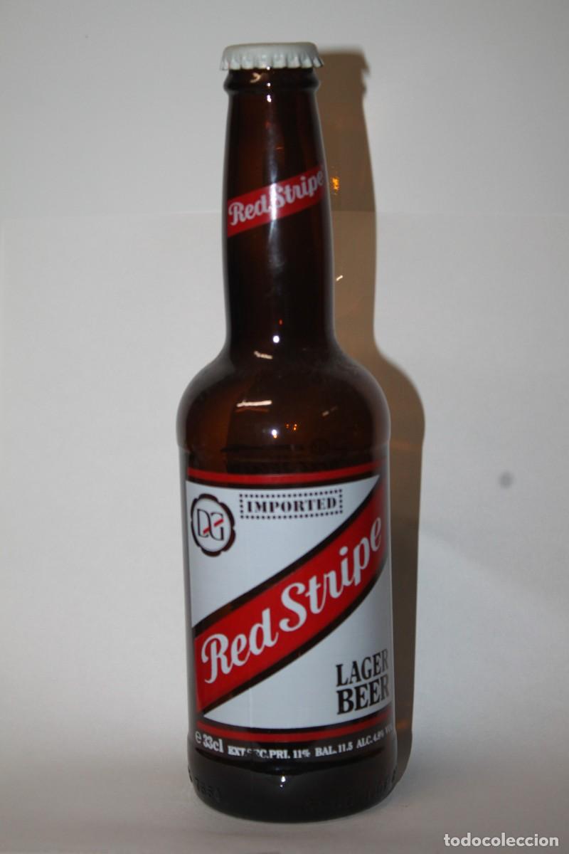 Coleccionismo de cervezas: BOTELLA CERVEZA RED STRIPE, 33 CL. VACIA, DE JAMAICA
