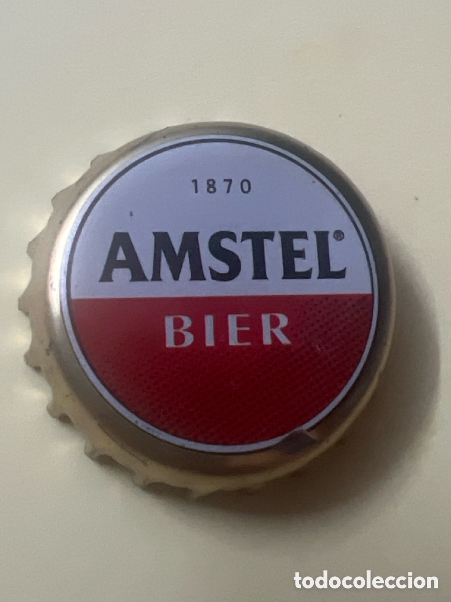 Coleccionismo de cervezas: T4/X112/F5. TAP&Oacute;N CORONA - CHAPA - CROWN CAPS - CERVEZA - AMSTEL BIER