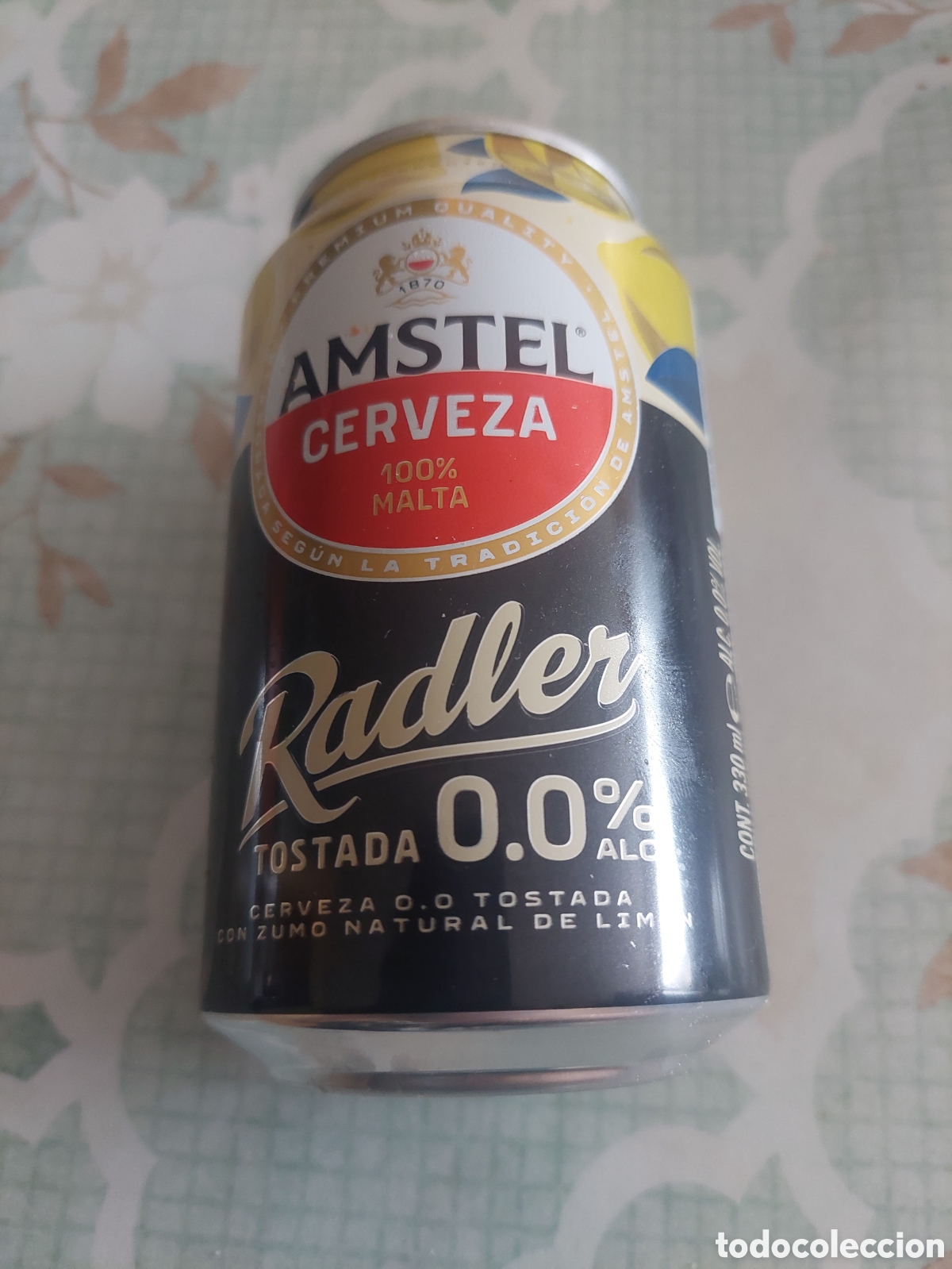 Coleccionismo de cervezas: AMSTEL CERVEZA RADLER TOSTADA 0.0 VAC&Iacute;A.