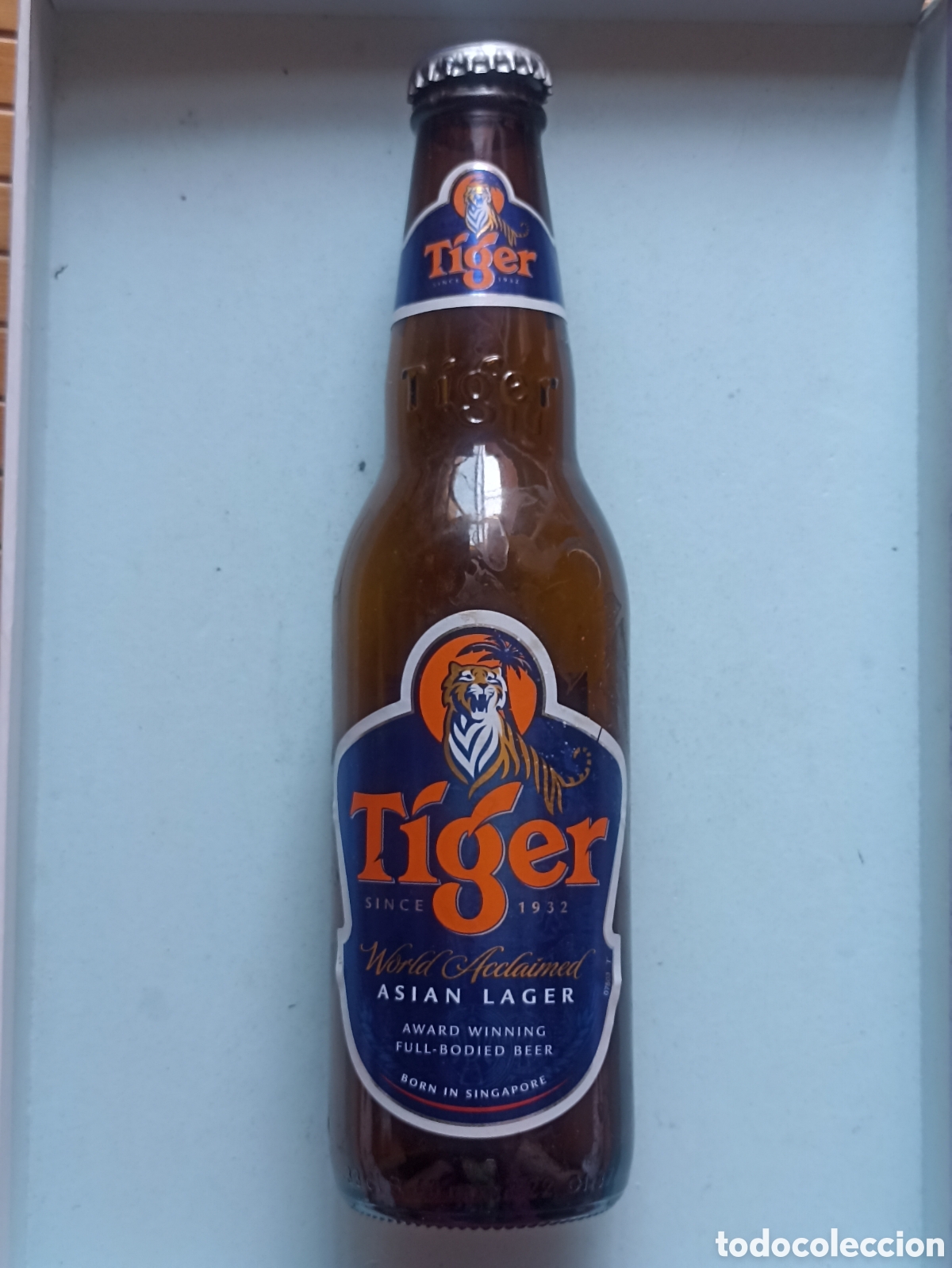Coleccionismo de cervezas: Botella cerveza Tiger vac&iacute;a con chapa 330 ml
