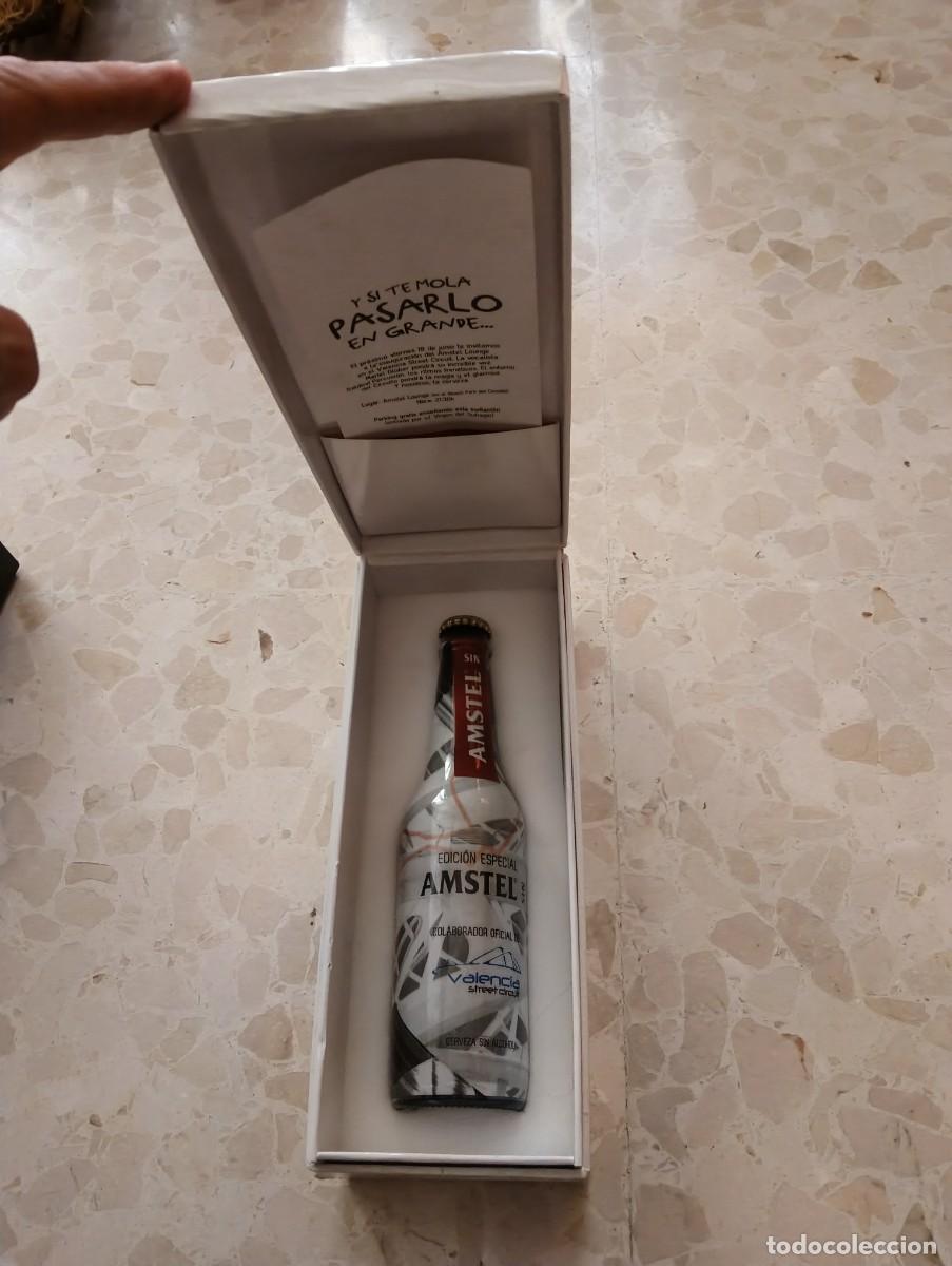 Coleccionismo de cervezas: BOTELLA CERVEZA 1/3 CRISTAL - AMSTEL SIN - 2010 VALENCIA STREET CIRCUIT F1 FORMULA 1 - CON CAJA