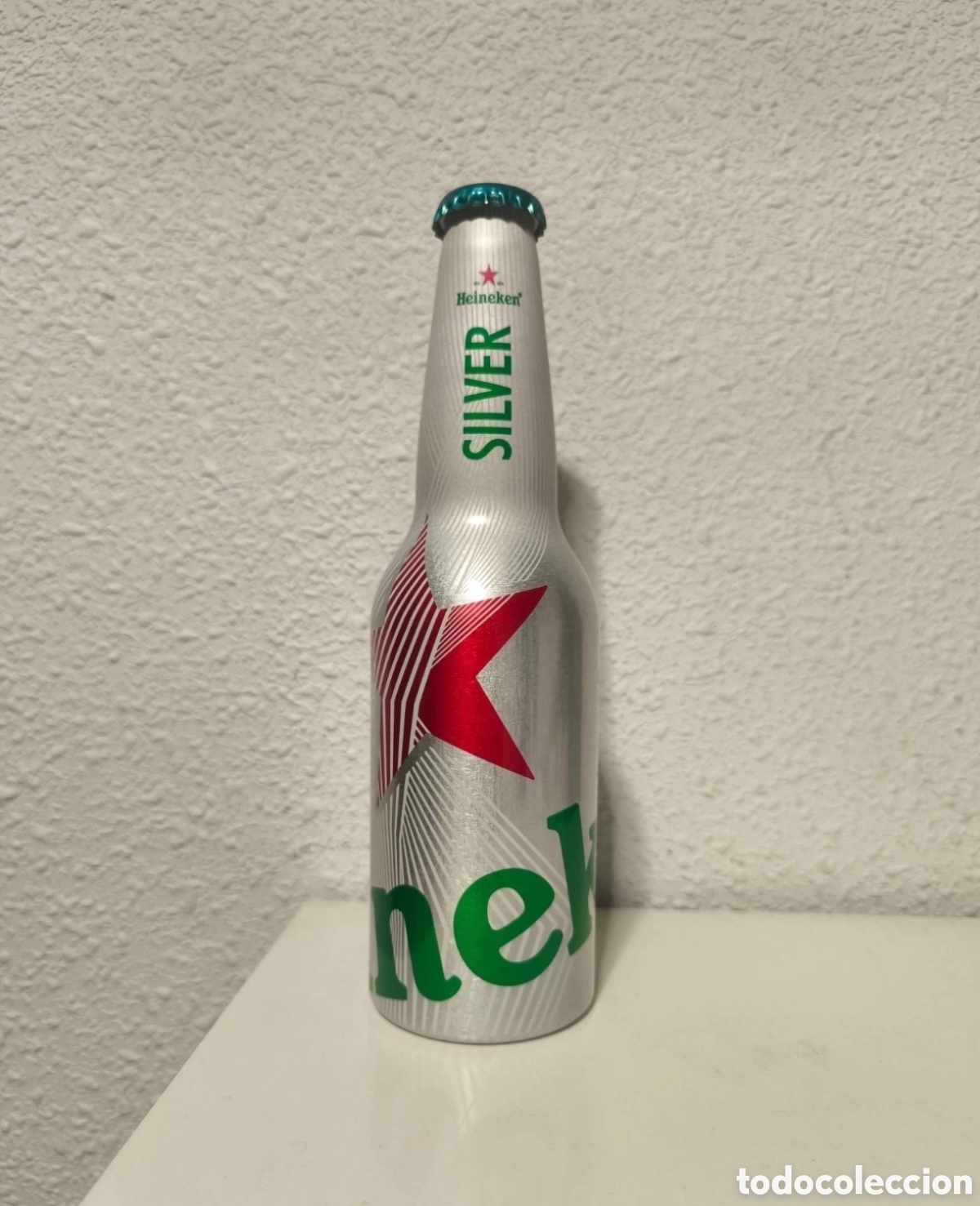 Coleccionismo de cervezas: Botella Heineken Silver China