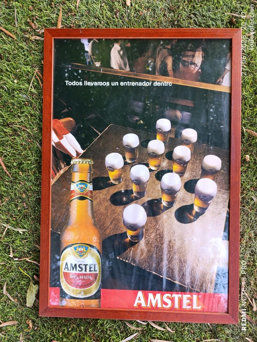 Coleccionismo de cervezas: Cerveza Aguila Amstel.Enmarcado con Cristal.