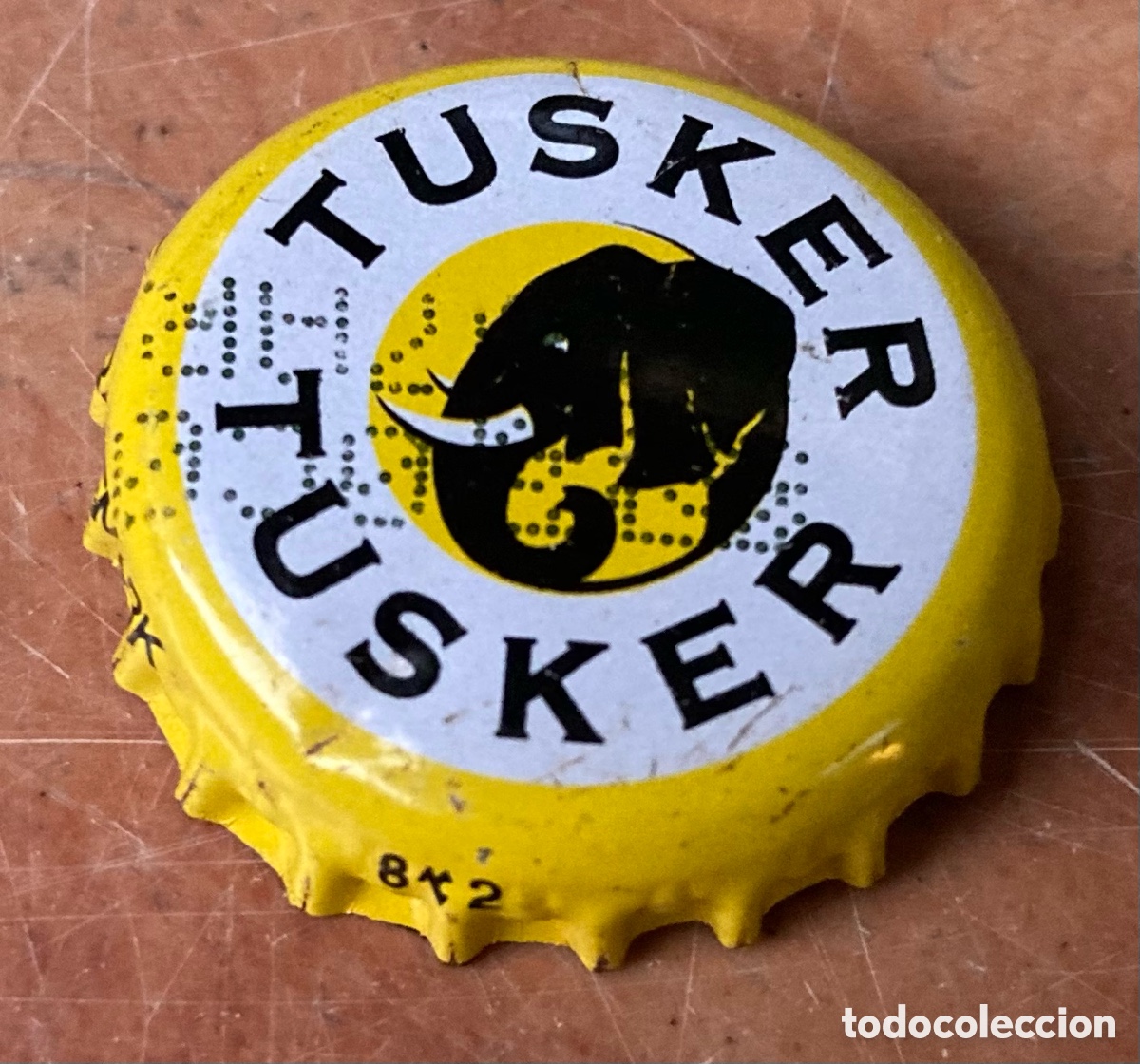 Coleccionismo de cervezas: BOTTLE CAP BEER TAP&Oacute;N CORONA BIRRA PIVO CHAPA CERVEZA TUSKER (12). KENYA.--LOTE N. 3785--CARMANJO