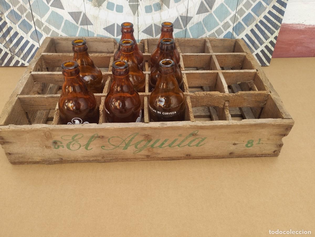 Coleccionismo de cervezas: Caja de Madera Cerveza El &Aacute;guila con 8 Botellines 33CL.