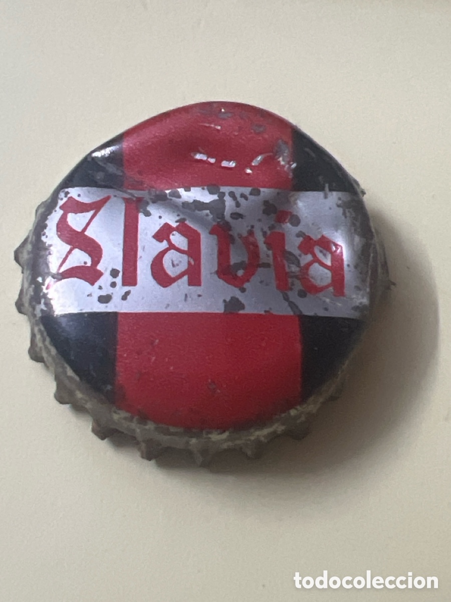 Collectionnisme de bi&egrave;res: T4/X129/J6. CHAPA CERVEZA - FRANCIA - CON CORCHO - Slavia