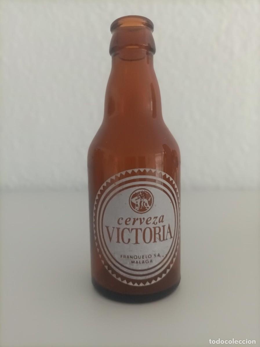 Coleccionismo de cervezas: Botellin antiguo cerveza Victoria