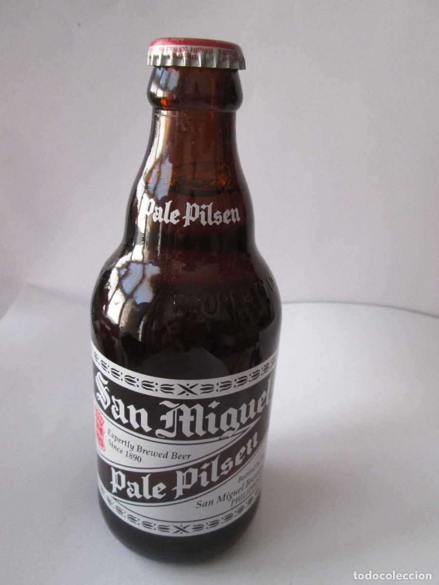Coleccionismo de cervezas: BOTELLA CERVEZA SAN MIGUEL PALE PILSEN - PHILIPPINES - RELIEVE SAN MIGUEL BREVERY PROPERTY OF -LLENA