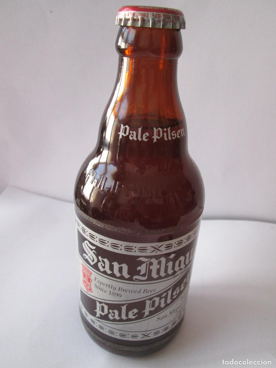 Coleccionismo de cervezas: BOTELLA CERVEZA SAN MIGUEL PALE PILSEN - PHILIPPINES - RELIEVE SAN MIGUEL BREVERY PHILIPPINES -LLENA