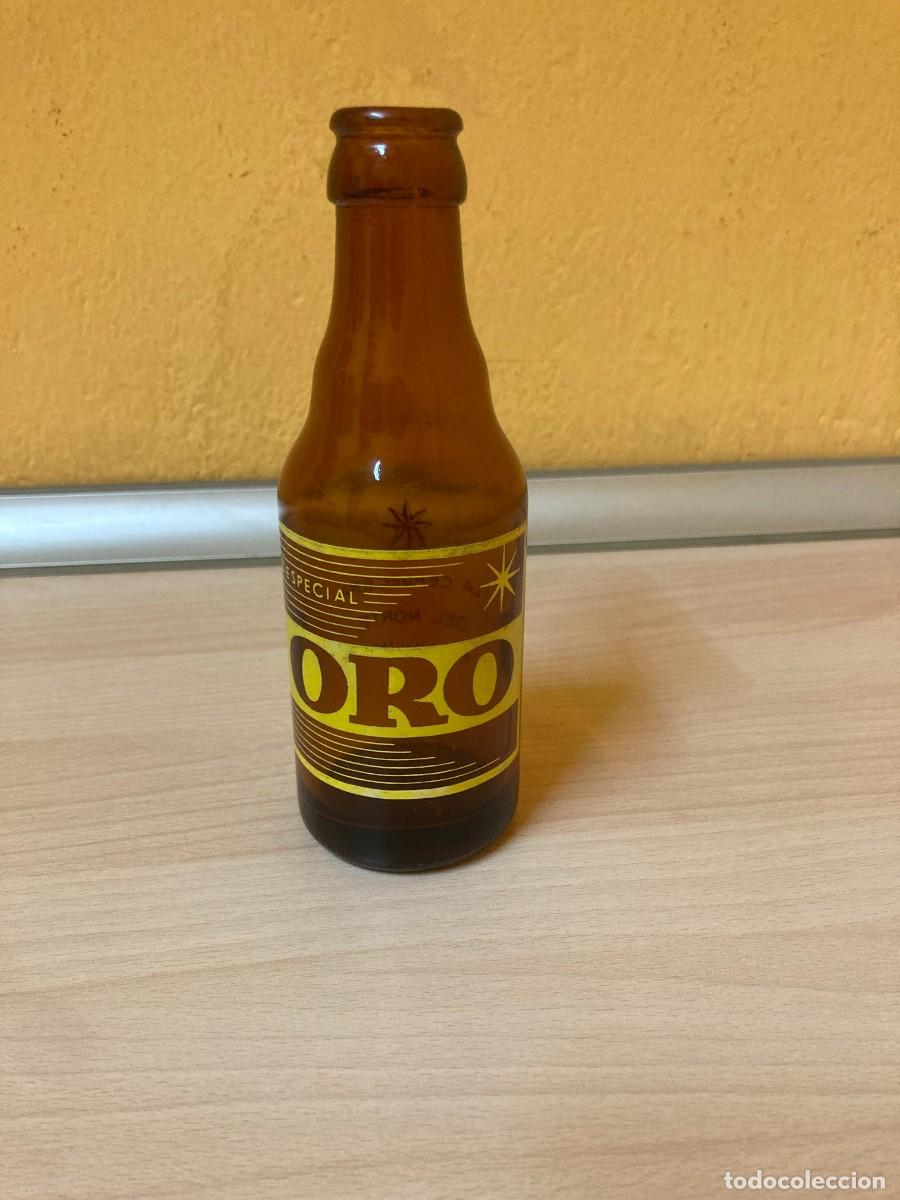 Coleccionismo de cervezas: BOTELLIN CERVEZA ORO - Foto 1