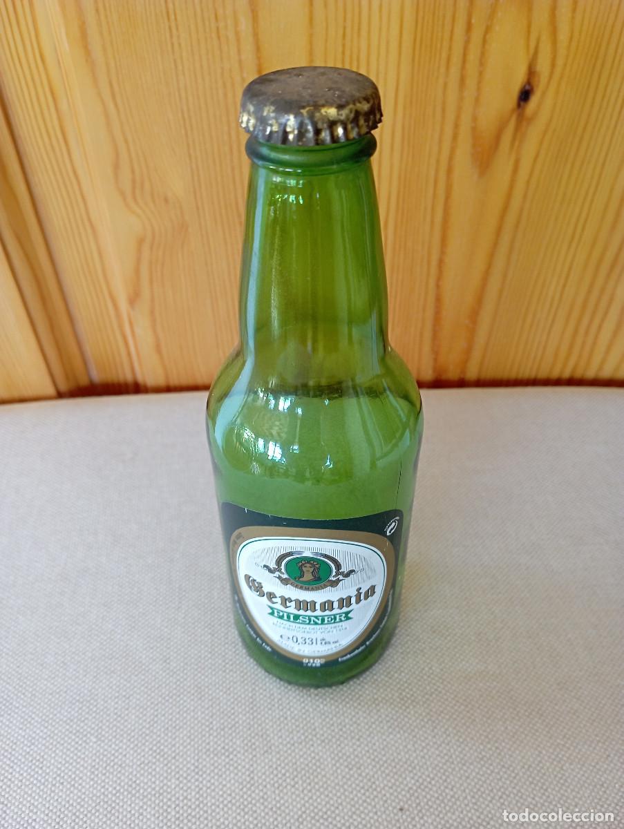 Coleccionismo de cervezas: BOTELLA CERVEZA GERMANIA PILSNER VACIA CON CHAPA