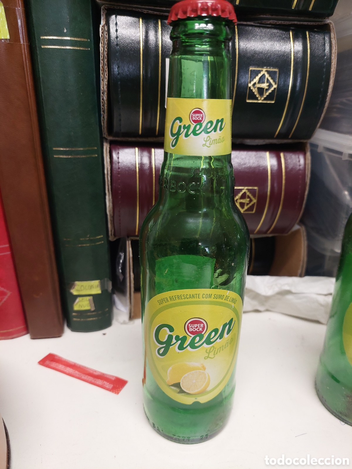 Coleccionismo de cervezas: BOTELLA GREEN LIMON SUPER BOCK CERVEZA VACIA