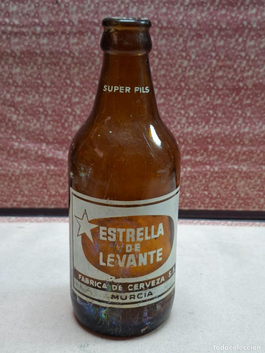 Coleccionismo de cervezas: ANTIGUA BOTELLA CERVEZA ESTRELLA DE LEVANTE MURCIA SUPER PILS