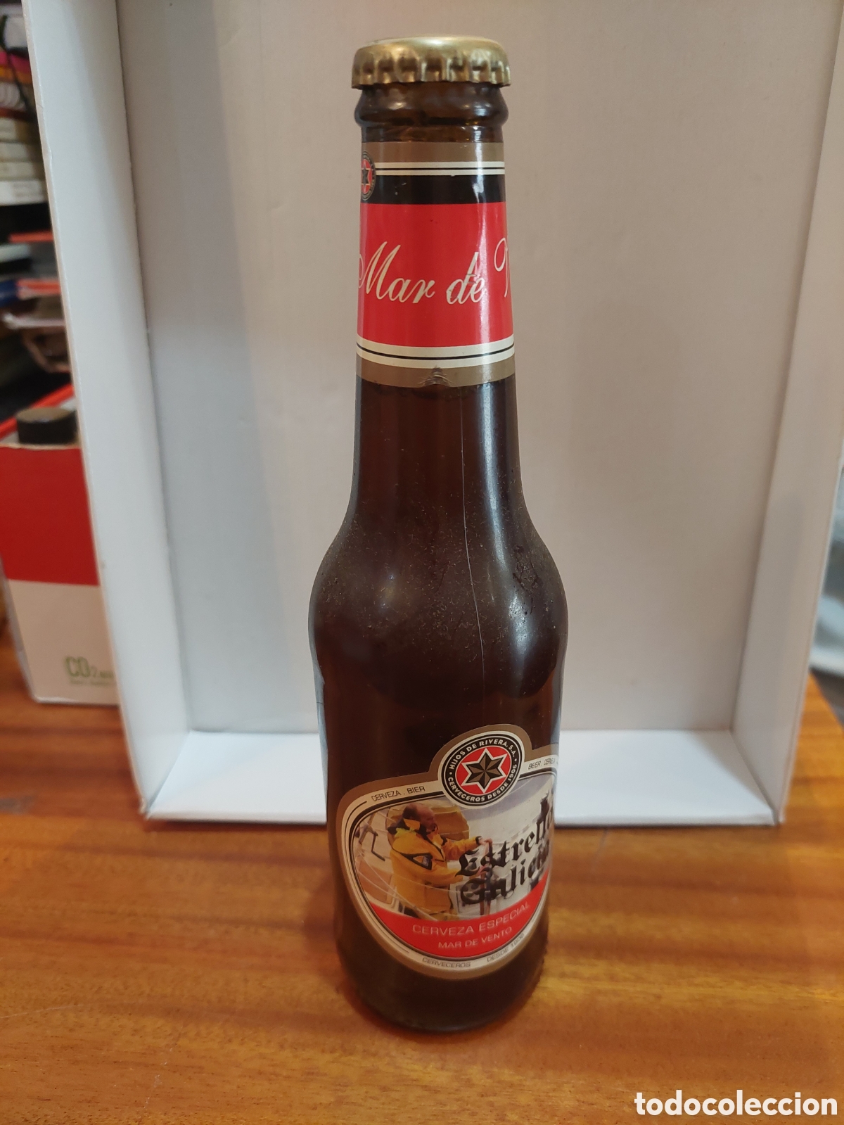 Coleccionismo de cervezas: MAR DE VENTO BOTELLA ESTRELLA GALICIA LLENA RARA 33 CL