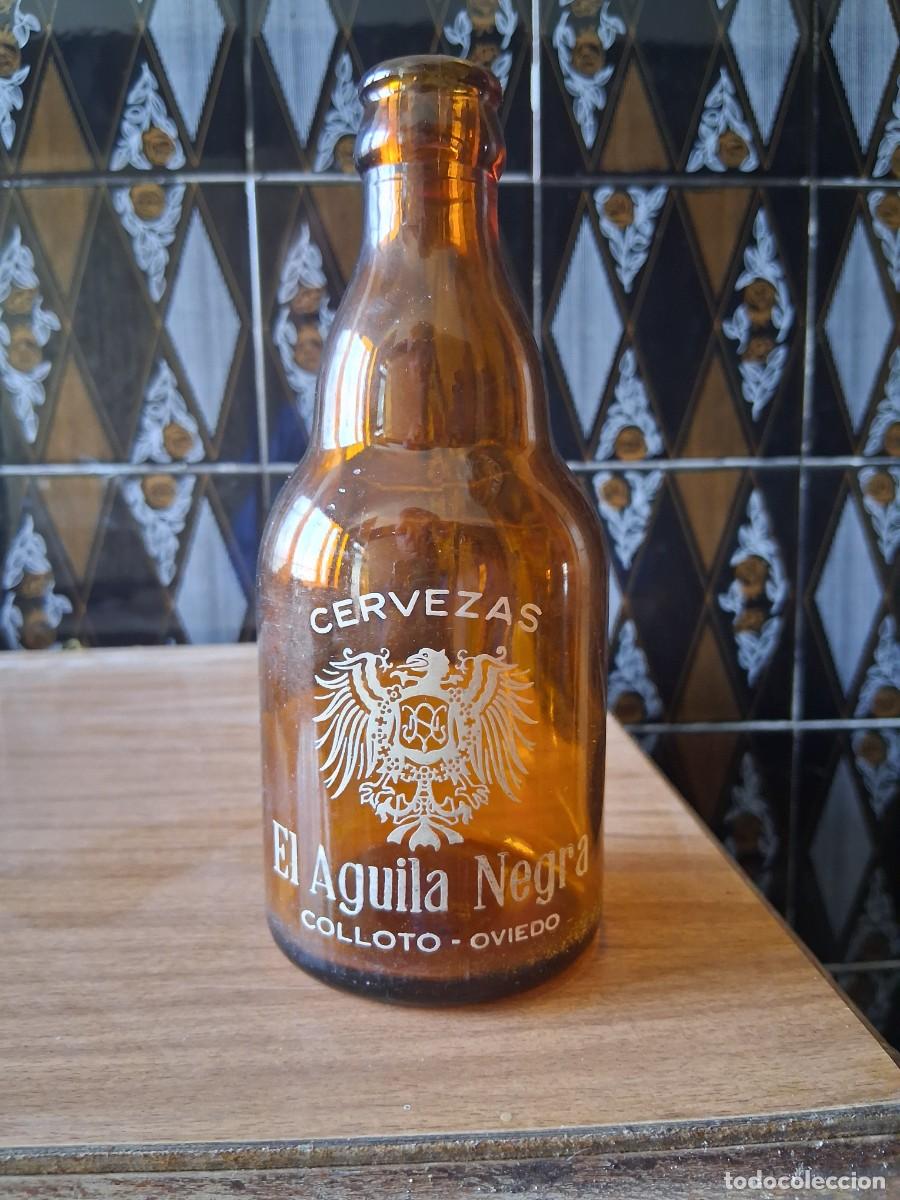 Coleccionismo de cervezas: Botella cerveza El aguila negra Colloto Oviedo Asturias tercio