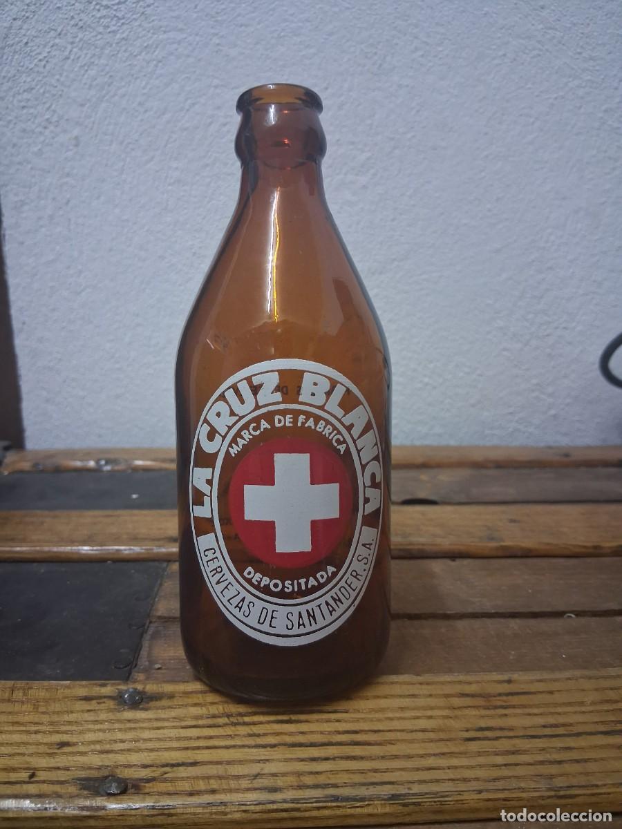Coleccionismo de cervezas: Botella cerveza La Cruz Blanca Santander tercio
