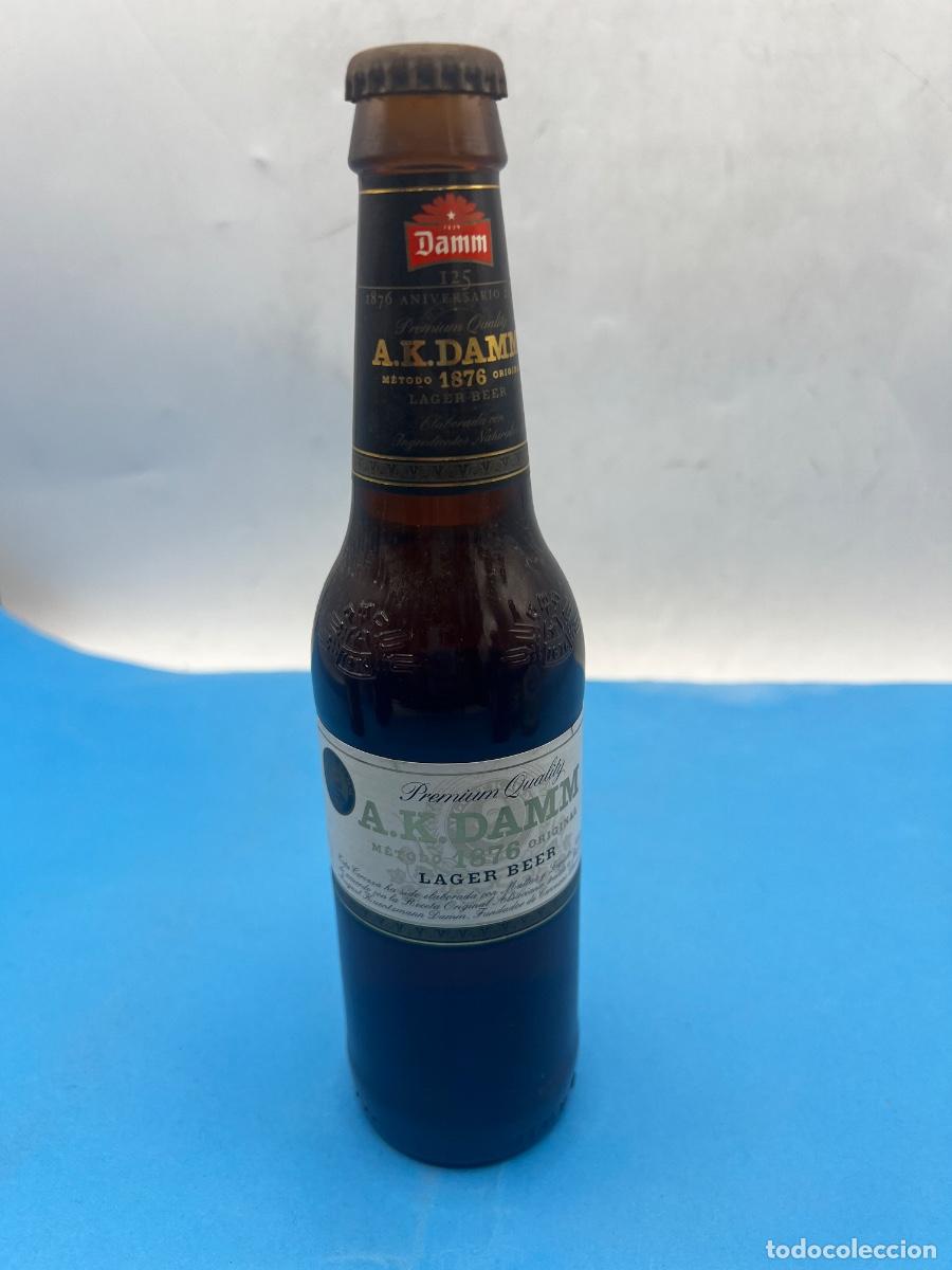 Coleccionismo de cervezas: BOTELLA. CERVEZA. A.K.DAMM. PREMIUM QUALITY. 1876. LAGER BEER.