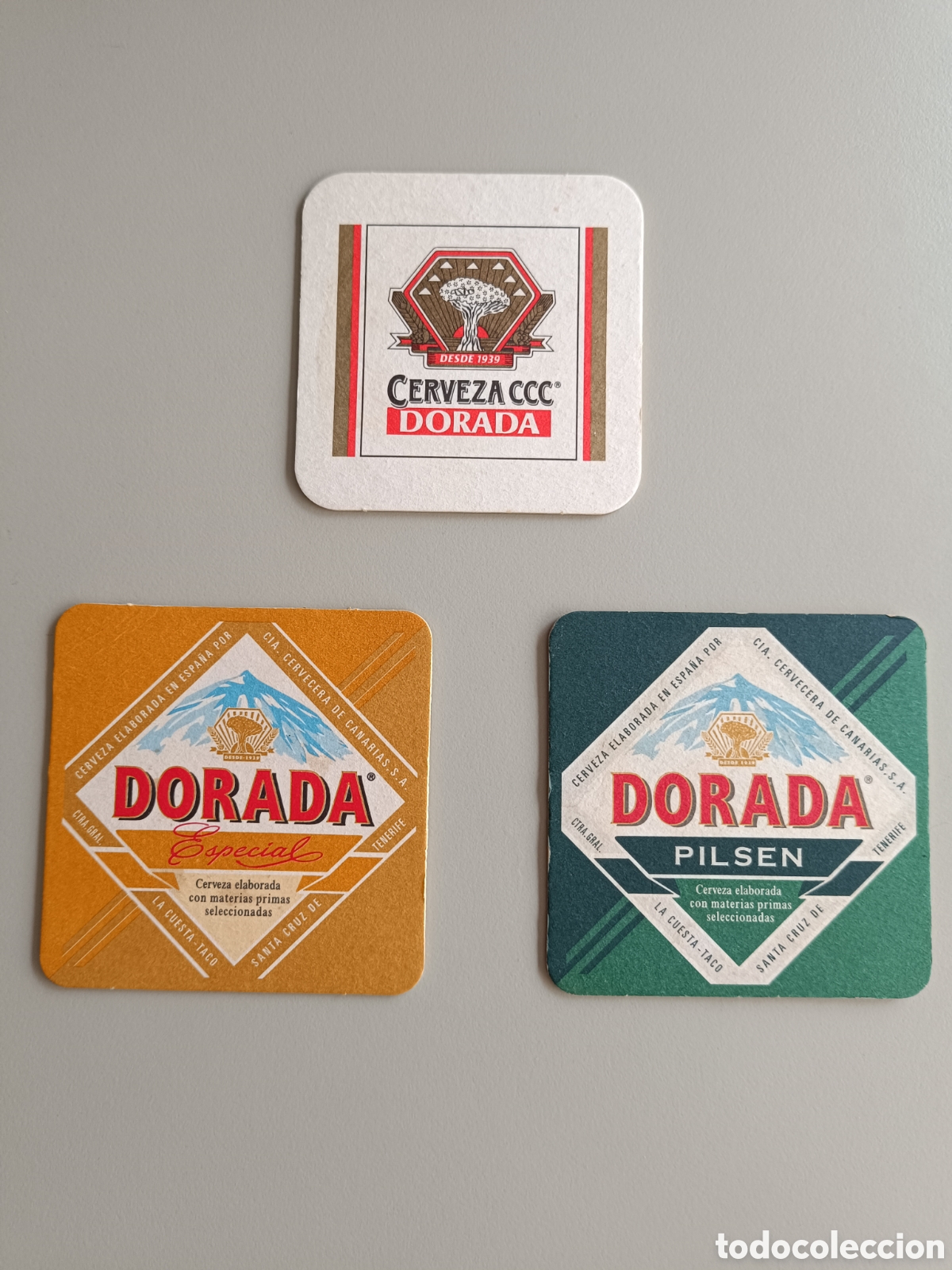 Collectionnisme de bi&egrave;res: lote de 3 posavasos de Cerveza Dorada (Compa&ntilde;&iacute;a Cervecera de Canarias)
