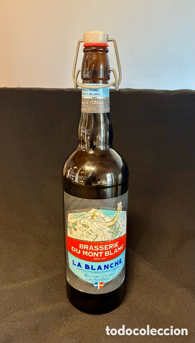 Coleccionismo de cervezas: BOTELLA CERVEZA VAC&Iacute;A &ldquo; La Blanche de la Brasserie du Mont Blanc&rdquo;