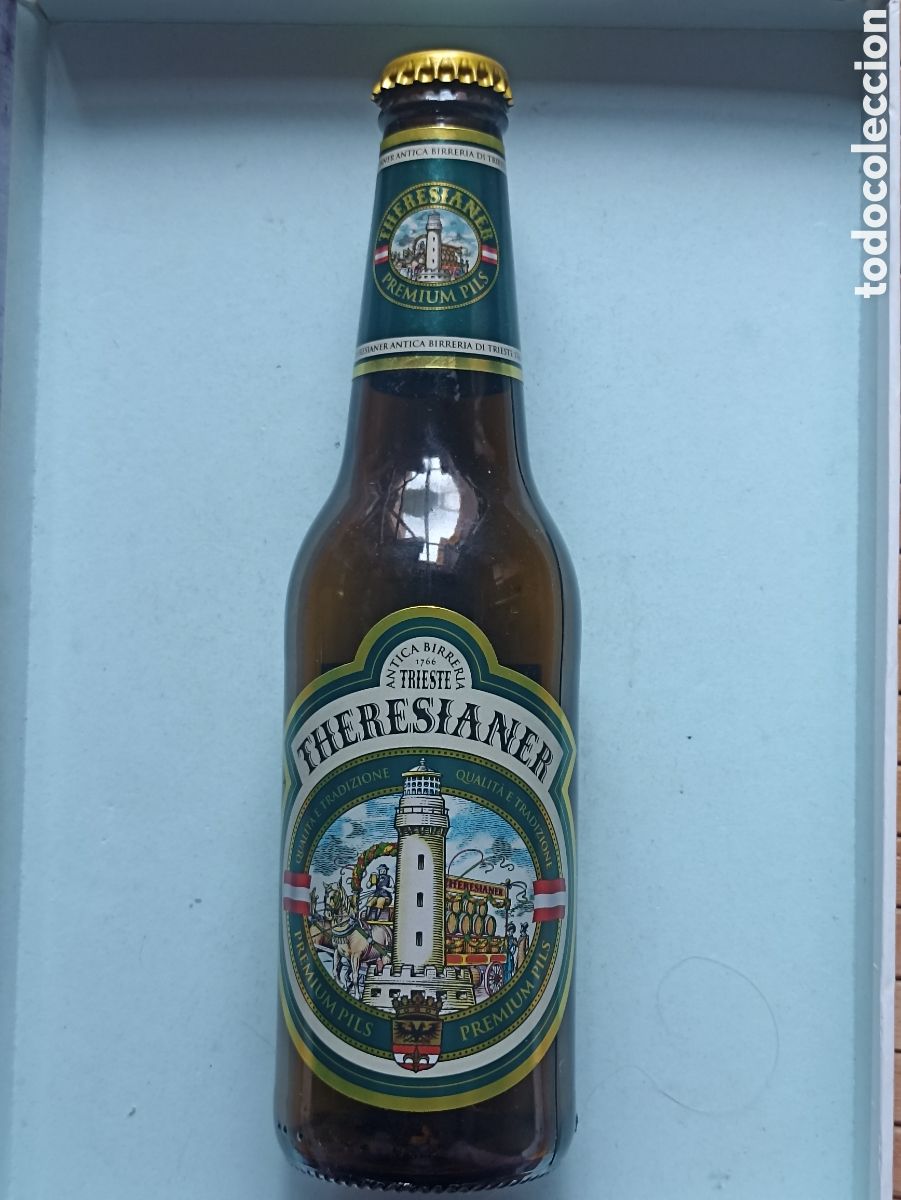Coleccionismo de cervezas: Botella cerveza Theresianer vac&iacute;a con chapa 330 ml