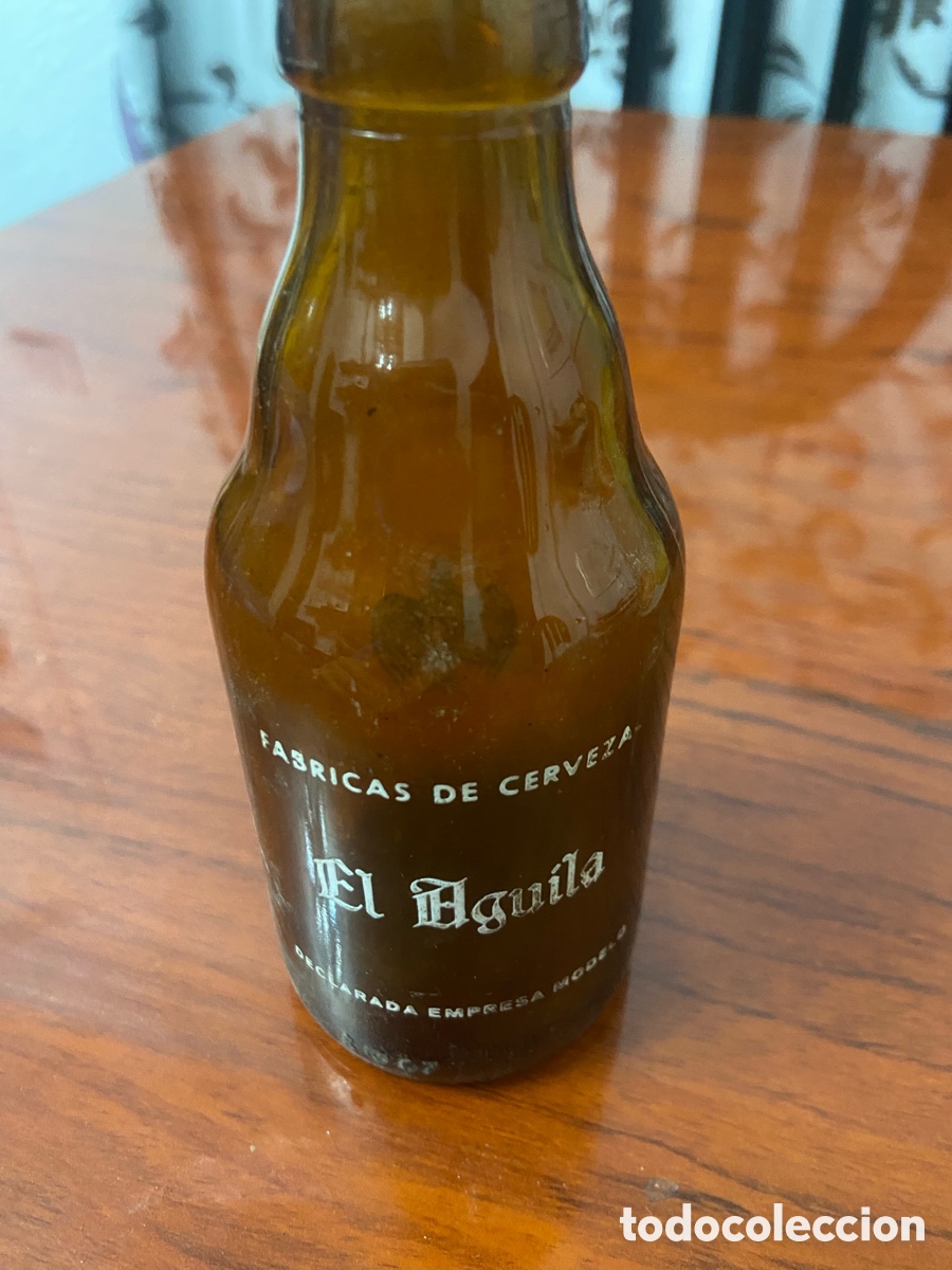 Coleccionismo de cervezas: Botella 1/5 cerveza el &aacute;guila - Foto 3