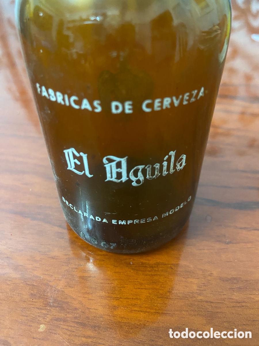 Coleccionismo de cervezas: Botella 1/5 cerveza el &aacute;guila