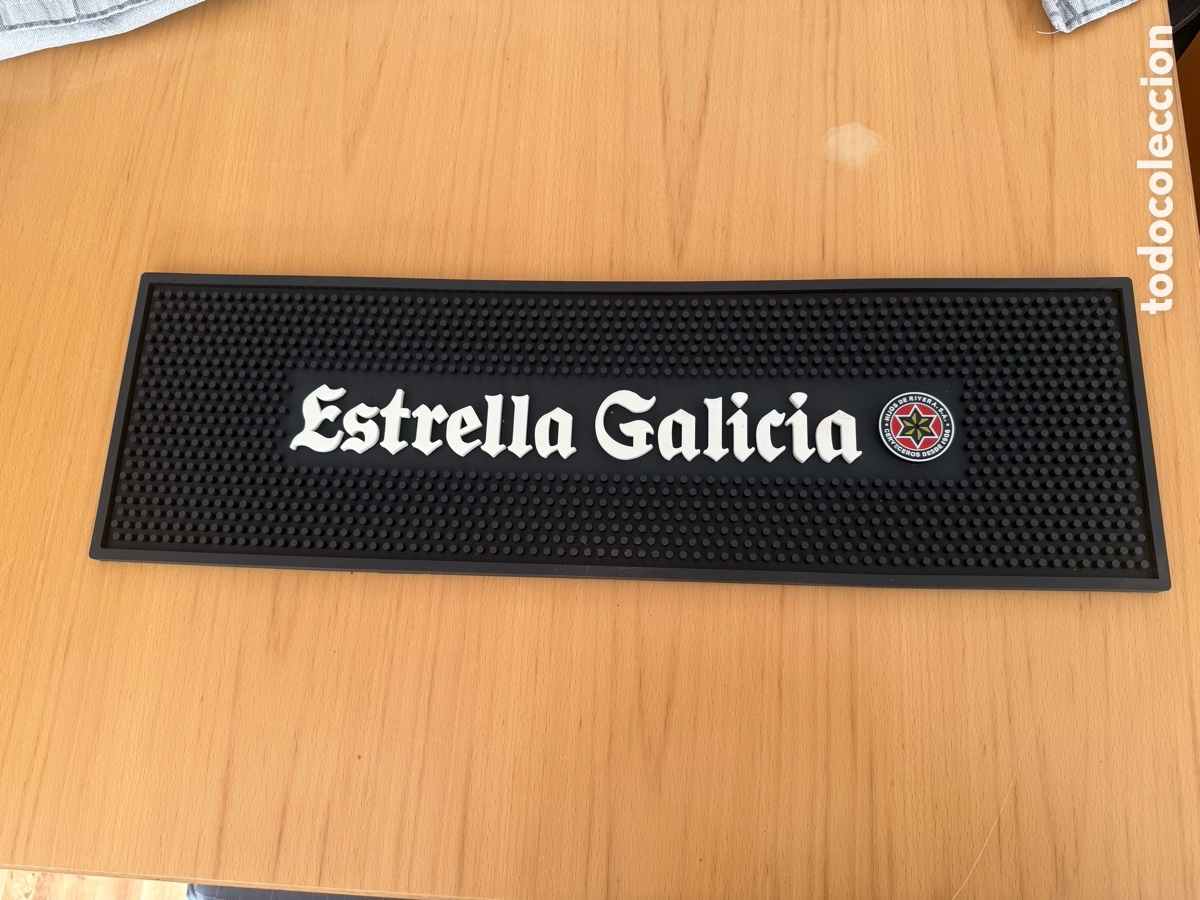 Coleccionismo de cervezas: Alfombrilla bar PVC marca ESTRE&Ntilde;LA GALICIA
