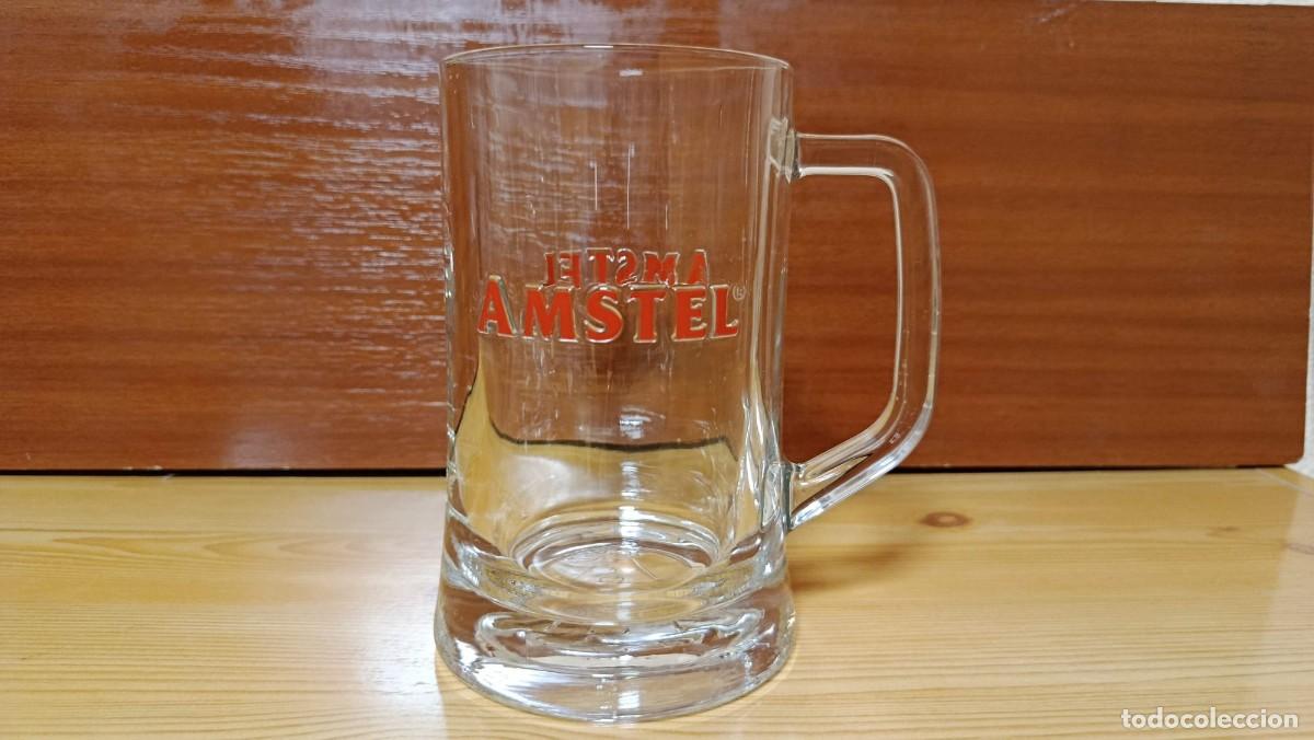 Coleccionismo de cervezas: Jarra de cerveza Amstel cristal con letras rojas en relieve 15 cm