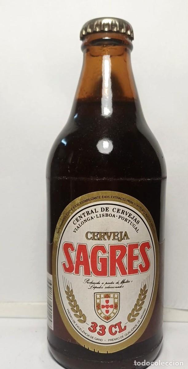 Coleccionismo de cervezas: Botella antigua Sagres 33 cl Portugal, fecha 1993, llena y cerrada