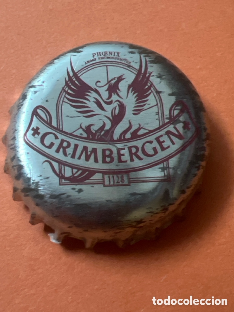Coleccionismo de cervezas: E47. CHAPA CERVEZA - B&Eacute;LGICA - Grimbergen Phoenix Ardet Nec Consumitur 1128