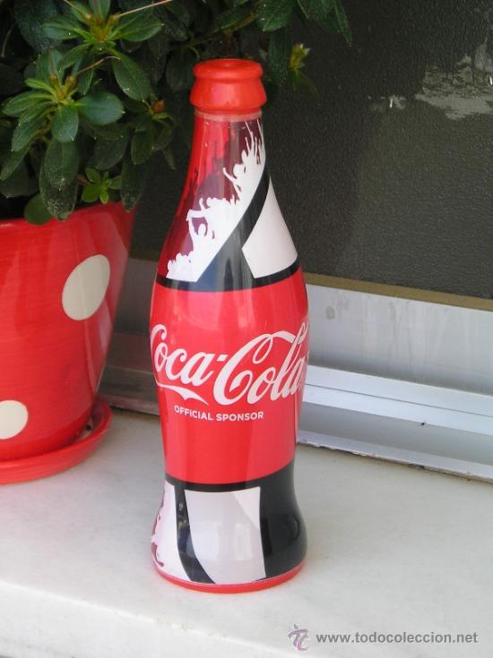 Coleccionismo de Coca-Cola y Pepsi: **BOTELLA-TROMPETA DE COCACOLA, ---UEFA EURO 2012** (SOPLAS POR EL TAPON Y SUENA)