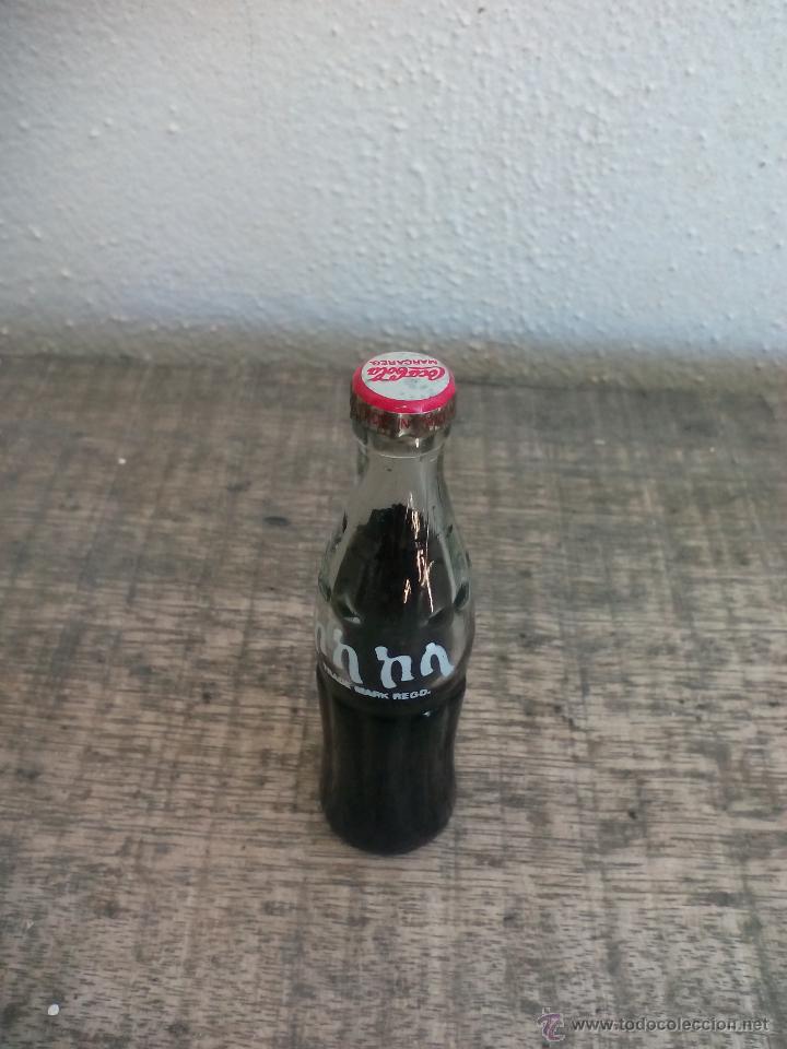 Coleccionismo de Coca-Cola y Pepsi: Mini botella de cristal de Coca-Cola, Coke. Cocacola bottle. 8 cm. Botellita de colecci&oacute;n.