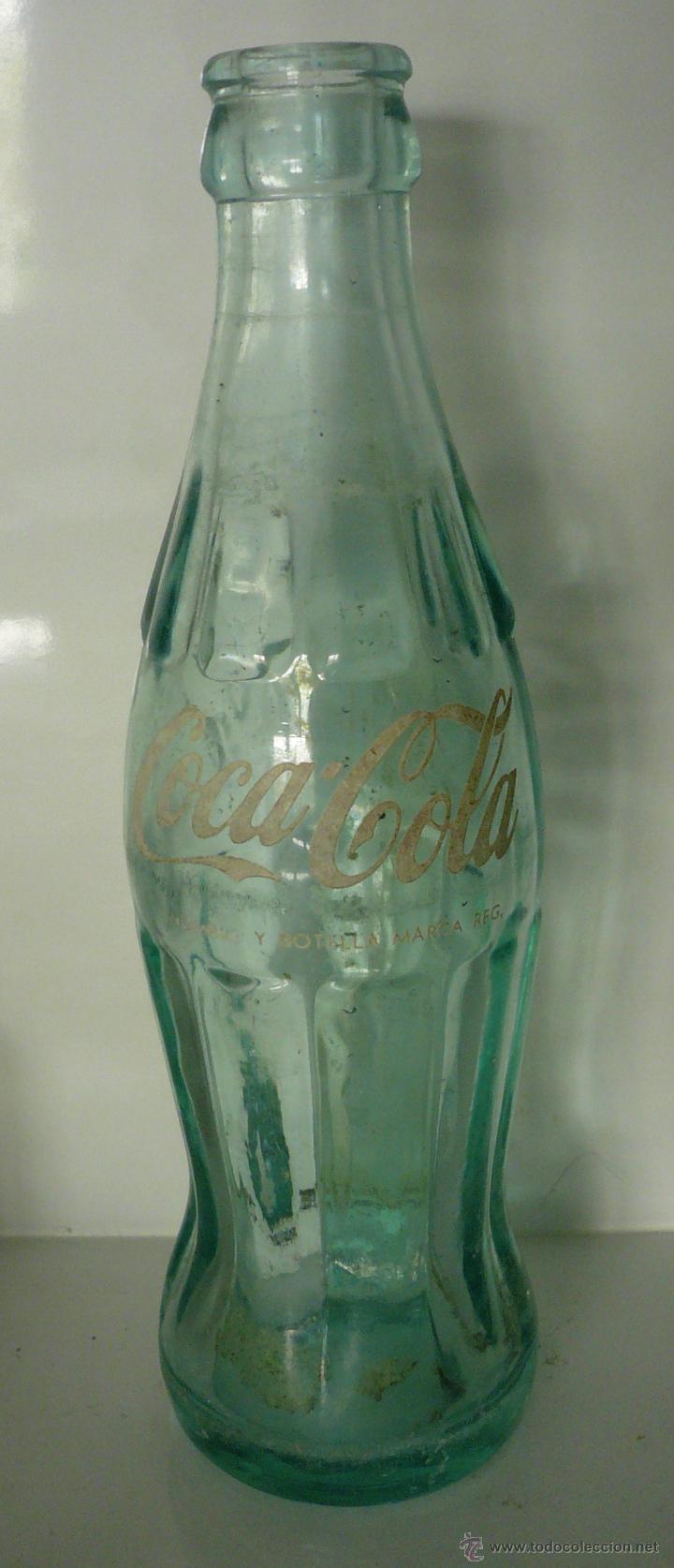 Coleccionismo de Coca-Cola y Pepsi: Botella de Coca Cola de los a&ntilde;os 70 - Foto 1