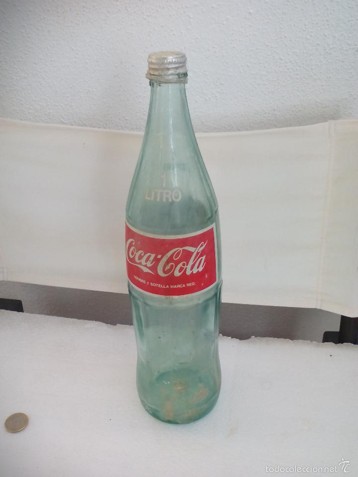 Collecting of Coca-Cola and Pepsi: Antigua botella de Coca-Cola, de 1 Litro, con su tap&oacute;n