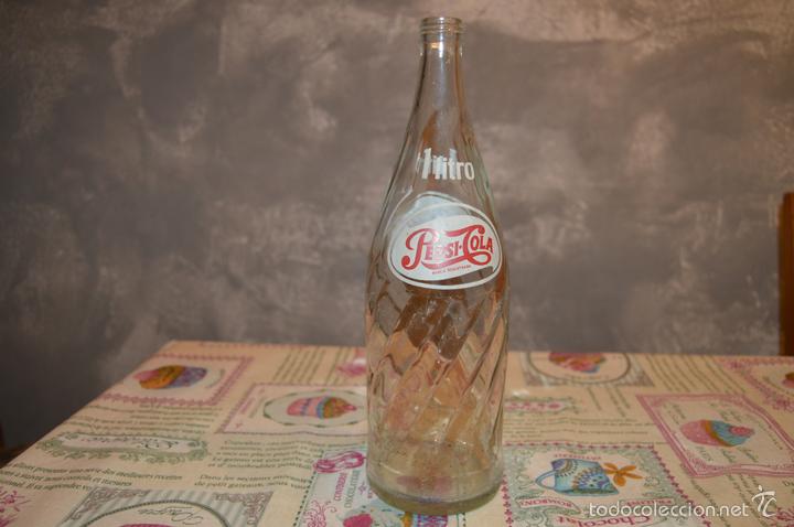 Coleccionismo de Coca-Cola y Pepsi: ANTIGUA BOTELLA DE VIDRIO VAC&Iacute;A DE PEPSI-COLA 1L.