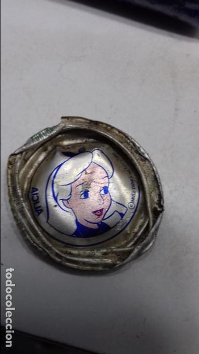 Collectionnisme de Coca-Cola et Pepsi: tapon mirinda lim&oacute;n con dibujo de Alicia en el pa&iacute;s de las maravillas. Esta escuchada. mirar foto
