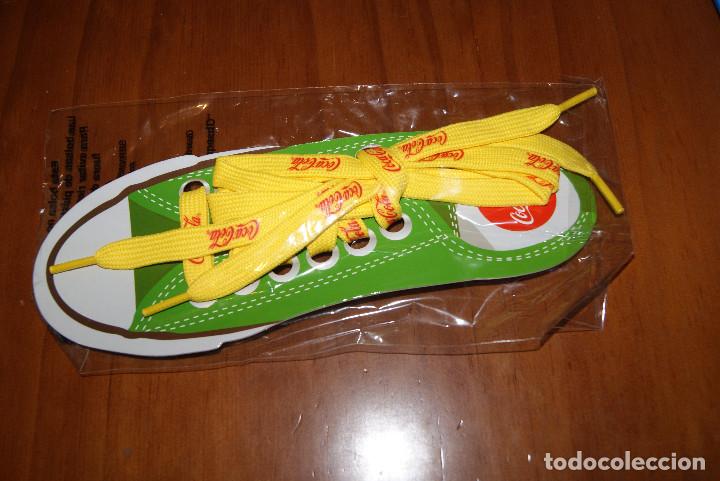Colecionismo de Coca-Cola e Pepsi: Cordones coca cola. Color amarillo. Sin abrir