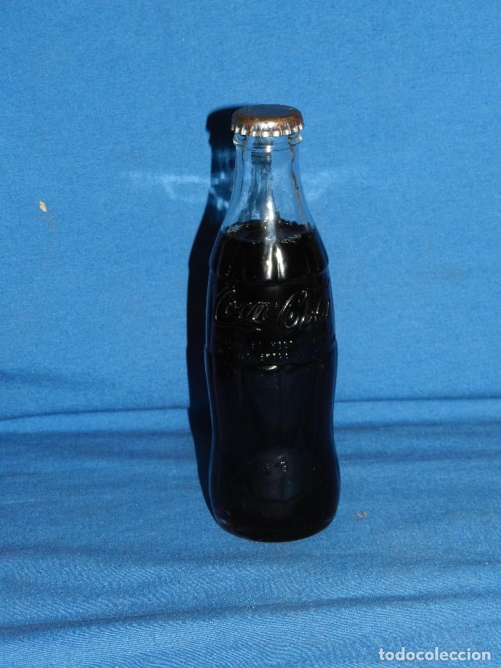 Sammeln von Coca-Cola und Pepsi: (A31) BOTELLA COCA-COLA ANTIGUA LLENA CON CHAPA FRANCESA , 20 CL, SE&Ntilde;ALES DE USO