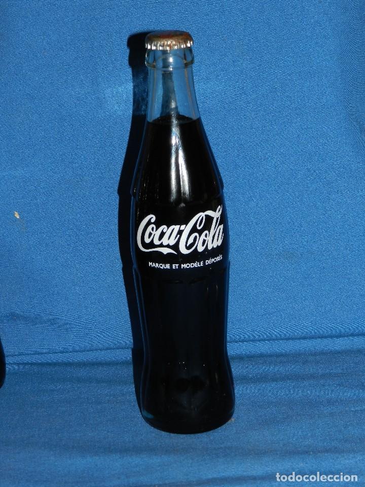 Sammeln von Coca-Cola und Pepsi: (A31) BOTELLA COCA-COLA ANTIGUA LLENA CON CHAPA FRANCIA , R15 , SE&Ntilde;ALES DE USO