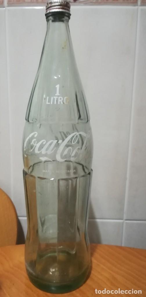 Botela de Coca Cola de 1'5 litros de cristal.