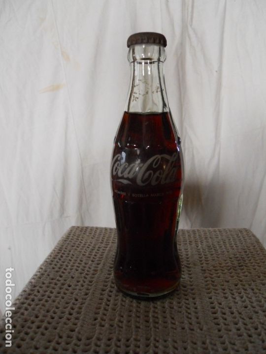 Collezionismo di Coca-Cola e Pepsi: antigua botella coca-cola con el contenido de la misma, tap&oacute;n oxidado de &eacute;poca
