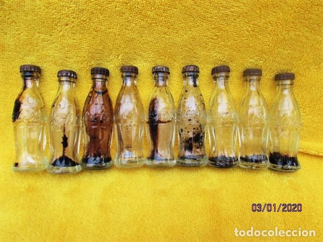 Coleccionismo de Coca-Cola y Pepsi: LOTE DE 9 BOTELLITAS DE COCA COLA VAC&Iacute;AS. A&Ntilde;OS 50.