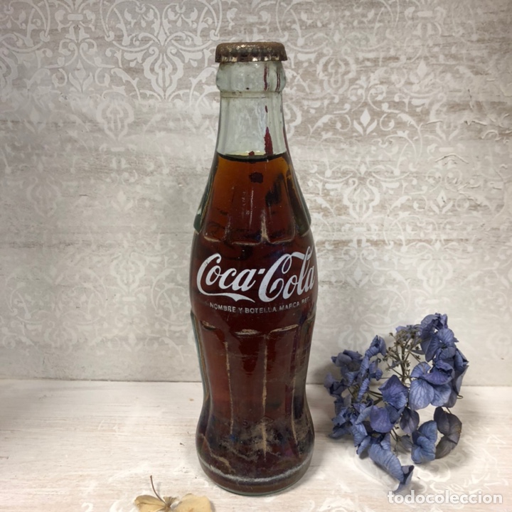 Collecting of Coca-Cola and Pepsi: ANTIGUA BOTELLA COCA COLA. CONTIENE L&Iacute;QUIDO. CERRADA. 19 CL. A&ntilde;os 70.