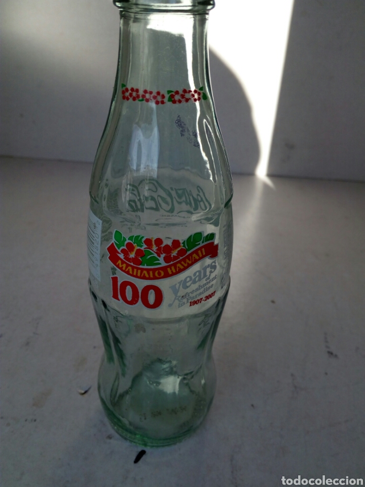 Collectionnisme de Coca-Cola et Pepsi: Botella de Coca-Cola vac&iacute;a de 100 a&ntilde;os en Hawaii