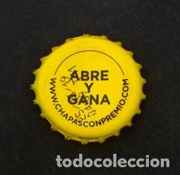 Collectionnisme de Coca-Cola et Pepsi: CHAPA - CON EL LEMA ABRE Y GANA - AMARILLA - BEBIDA