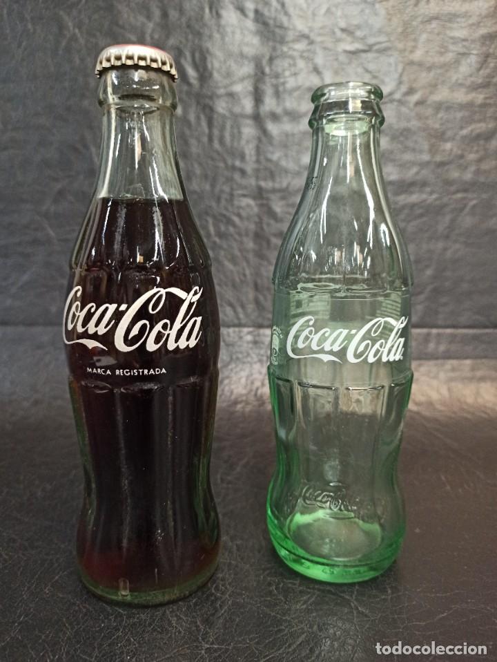 Coleccionismo de Coca-Cola y Pepsi: Dos botellas de Coca-Cola distintas. C42 - Foto 1