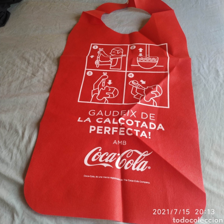Sammeln von Coca-Cola und Pepsi: Original babero pitet cal&ccedil;otada con publicidad de Coca-Cola