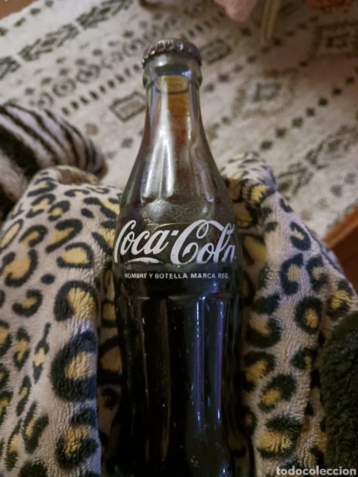 Collectionnisme de Coca-Cola et Pepsi: Botella de Coca-Cola antigua llena