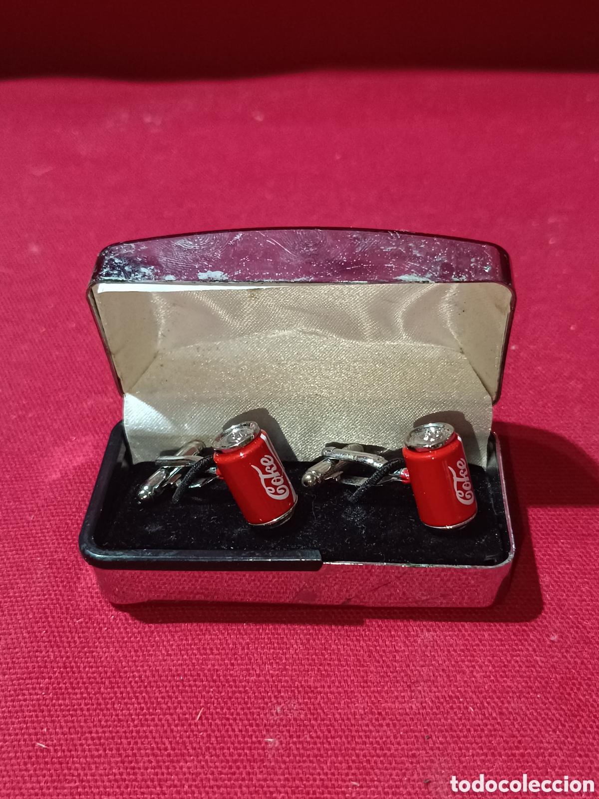 Collezionismo di Coca-Cola e Pepsi: Pareja de gemelos de acero con forma de Botes de Coca Cola